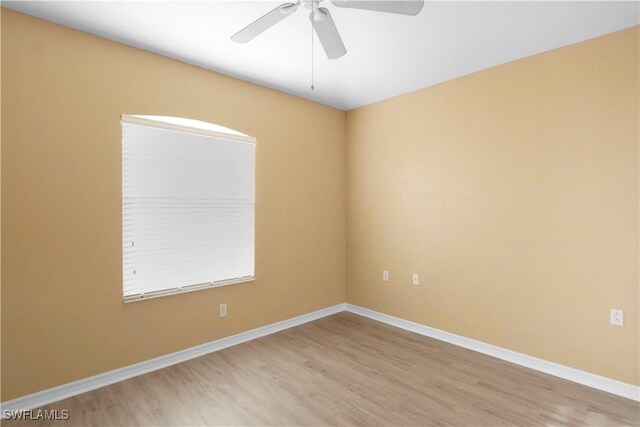 unfurnished room with ceiling fan and light hardwood / wood-style flooring