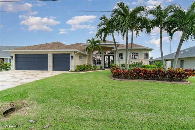 view of front of house featuring an attached garage, stucco siding, concrete driveway, and a front yard