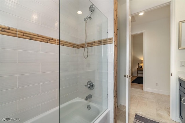 full bath with shower / tub combination, baseboards, and vanity