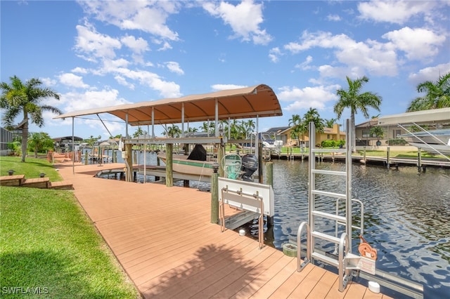 view of dock with a water view and boat lift