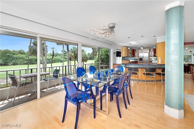 dining room with light hardwood / wood-style floors