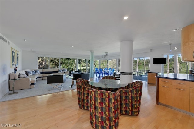 107 Clubhouse Dr Unit 258, Naples, FL 34105 - dining space with visible vents, plenty of natural light, light wood-style flooring, and recessed lighting