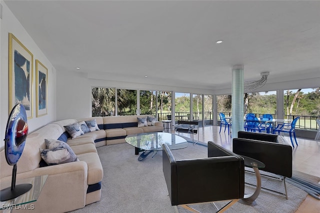 living area with a wealth of natural light and recessed lighting