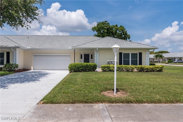 7076 E Brandywine Cir, Fort Myers, FL 33919 - ranch-style home with an attached garage, stucco siding, a front lawn, and concrete driveway