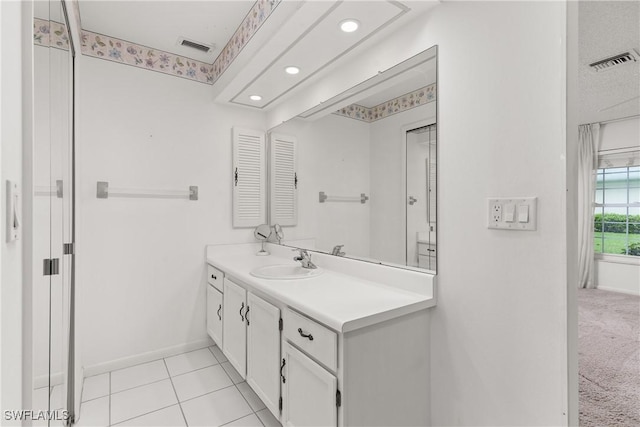 7076 E Brandywine Cir, Fort Myers, FL 33919 - bathroom featuring vanity, baseboards, and recessed lighting