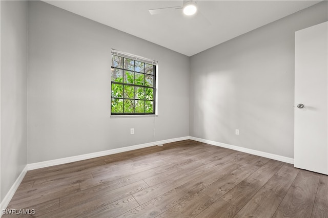 empty room with wood-type flooring