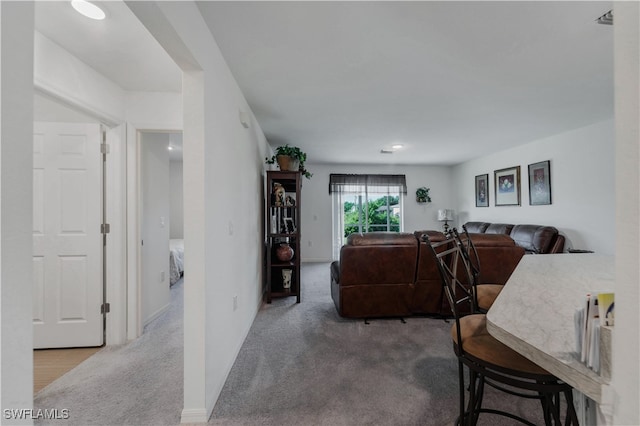 living room featuring carpet flooring