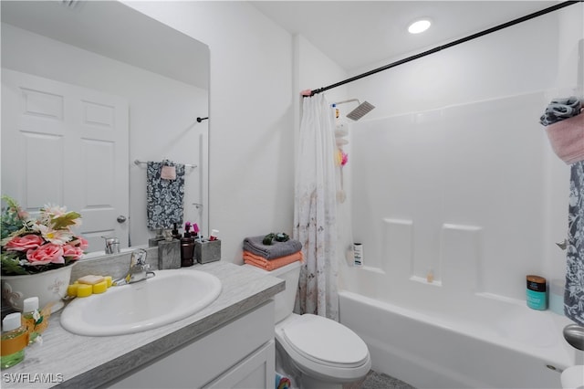 full bathroom featuring shower / tub combo, toilet, and vanity