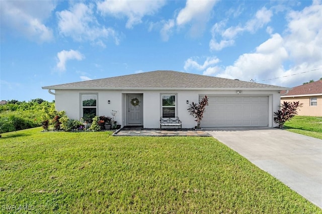 ranch-style home with a garage and a front lawn