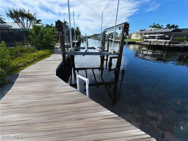 view of dock featuring a water view