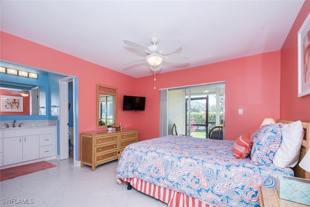 tiled bedroom featuring ceiling fan, access to exterior, ensuite bath, and sink