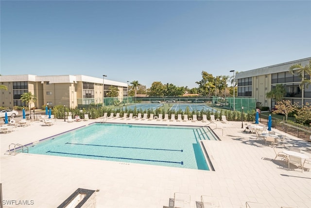 view of swimming pool featuring a patio