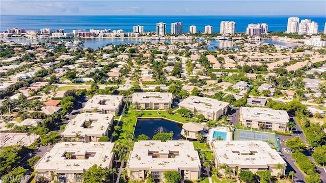 drone / aerial view with a water view