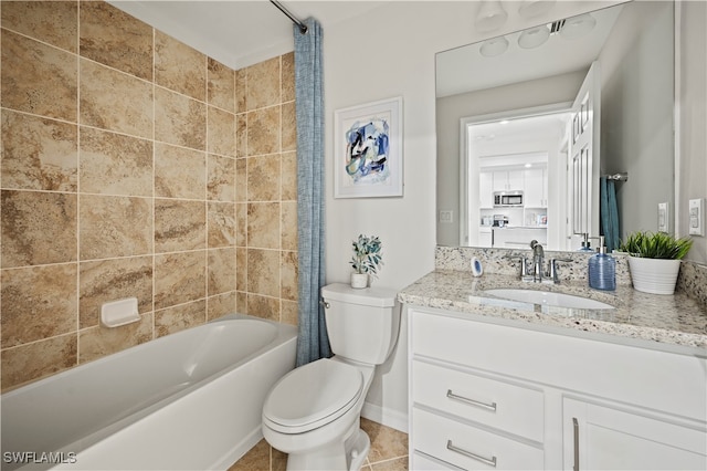 full bathroom featuring shower / tub combo, tile patterned floors, toilet, and vanity