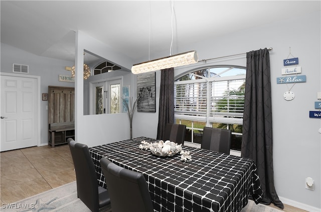 dining room featuring light tile patterned flooring