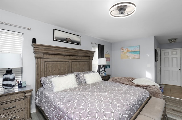 bedroom with wood-type flooring