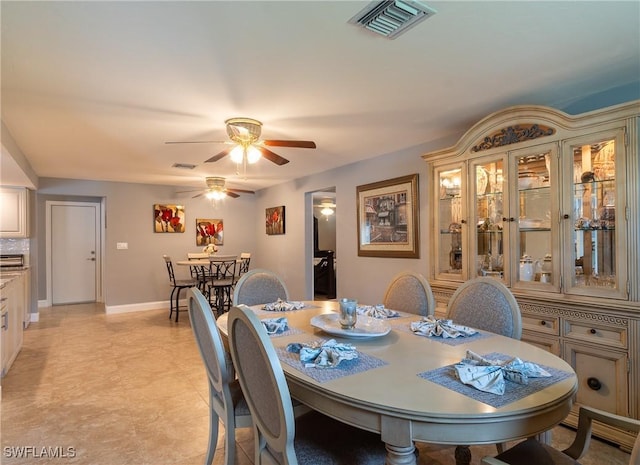 dining area with ceiling fan