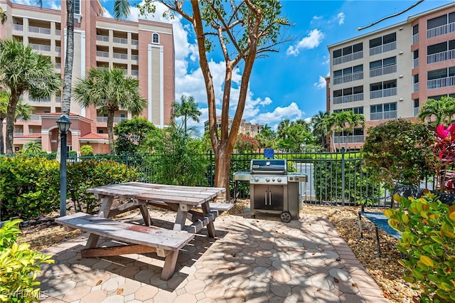 view of property's community featuring a patio area