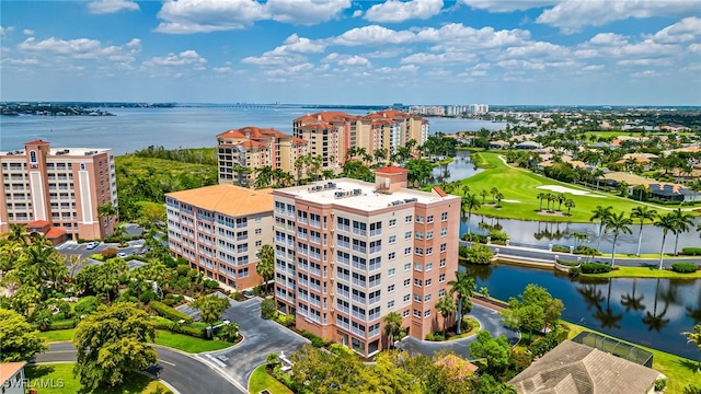 birds eye view of property featuring a water view