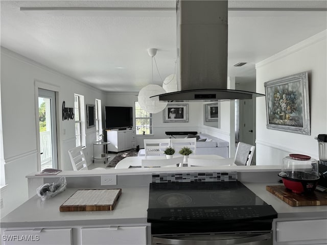 kitchen with ornamental molding, island exhaust hood, and black range with electric cooktop