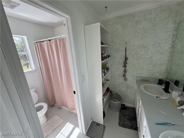 bathroom with tile patterned floors, toilet, ornamental molding, curtained shower, and vanity