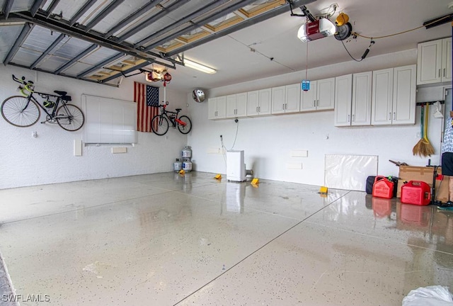 1201 SW 13th St, Cape Coral, FL 33991 - garage featuring a garage door opener