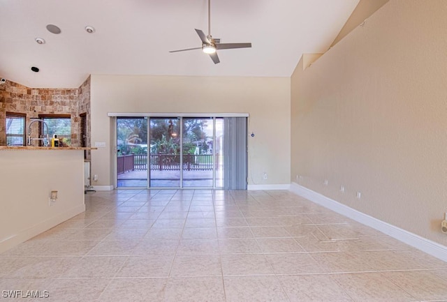 1201 SW 13th St, Cape Coral, FL 33991 - empty room with light tile patterned flooring, baseboards, and ceiling fan