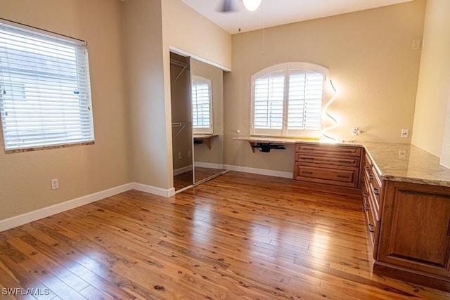 1201 SW 13th St, Cape Coral, FL 33991 - unfurnished bedroom featuring baseboards, light wood-style flooring, and a closet