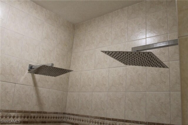 details featuring a tile shower