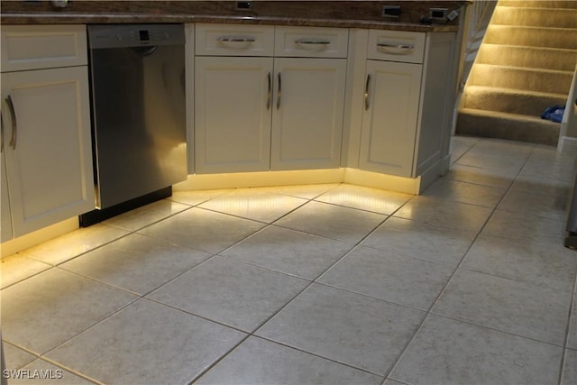 interior details featuring dishwasher and white cabinets