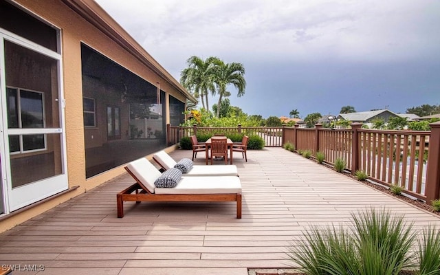 1201 SW 13th St, Cape Coral, FL 33991 - deck featuring outdoor dining area