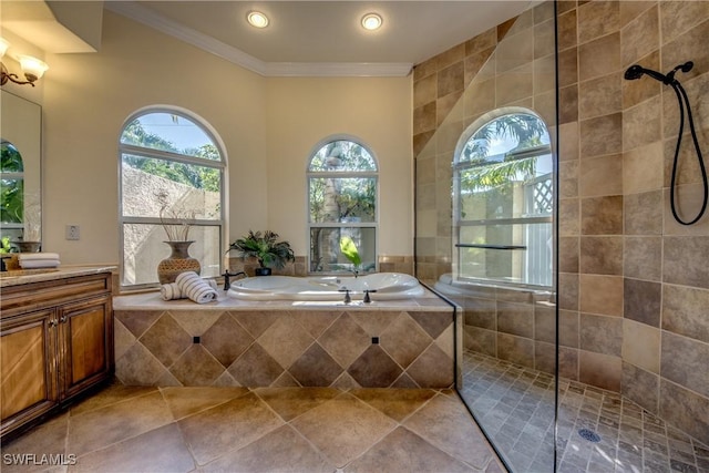 full bathroom featuring a garden tub, tile patterned flooring, vanity, walk in shower, and crown molding