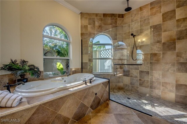 bathroom featuring shower with separate bathtub and crown molding