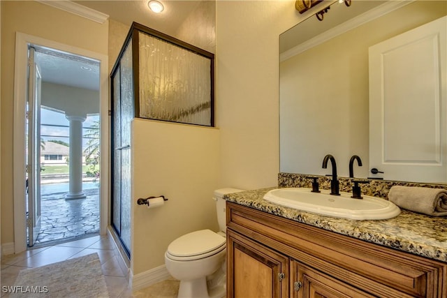 full bath featuring crown molding, toilet, a shower stall, ornate columns, and tile patterned floors