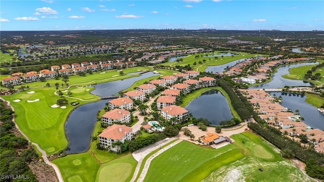 aerial view featuring view of golf course, a water view, and a residential view