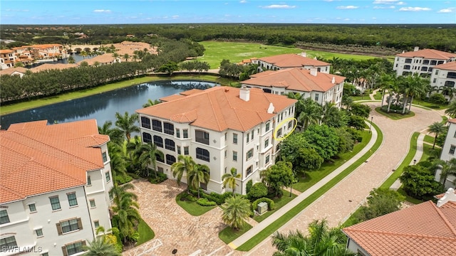 drone / aerial view with a water view