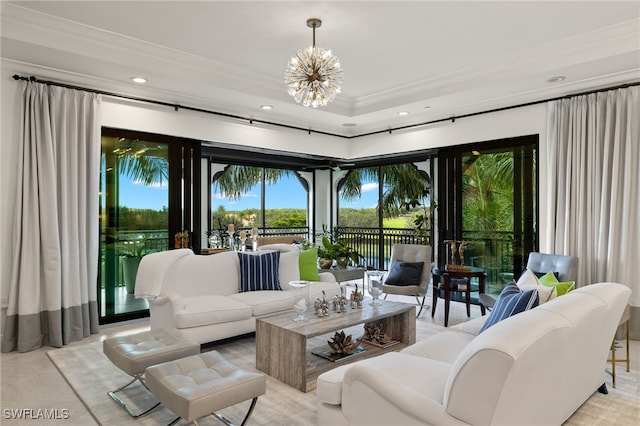 living room with an inviting chandelier, ornamental molding, and recessed lighting