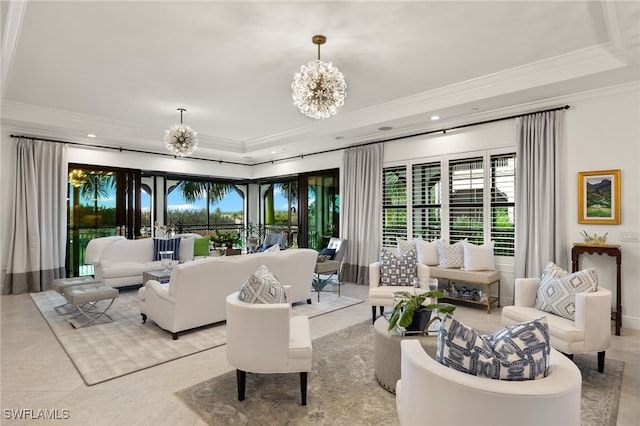 living room featuring an inviting chandelier, a raised ceiling, ornamental molding, and plenty of natural light