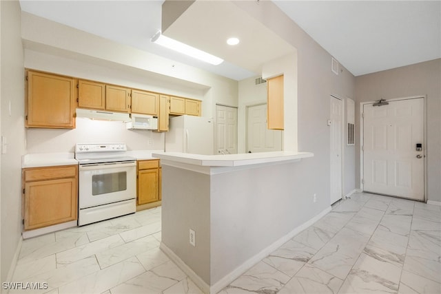 kitchen featuring white appliances, marble finish floor, baseboards, and under cabinet range hood