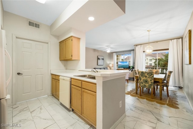 kitchen featuring white appliances, visible vents, marble finish floor, and a sink