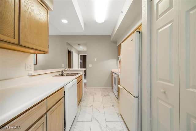 kitchen featuring marble finish floor, light countertops, a sink, white appliances, and baseboards