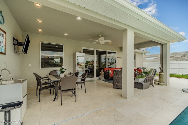 view of patio / terrace with ceiling fan and an outdoor hangout area