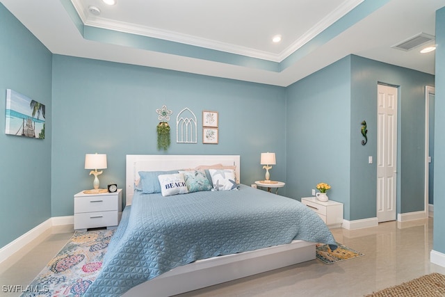 bedroom featuring crown molding and a raised ceiling