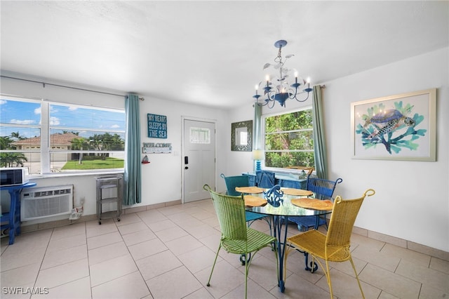 tiled dining space featuring a notable chandelier