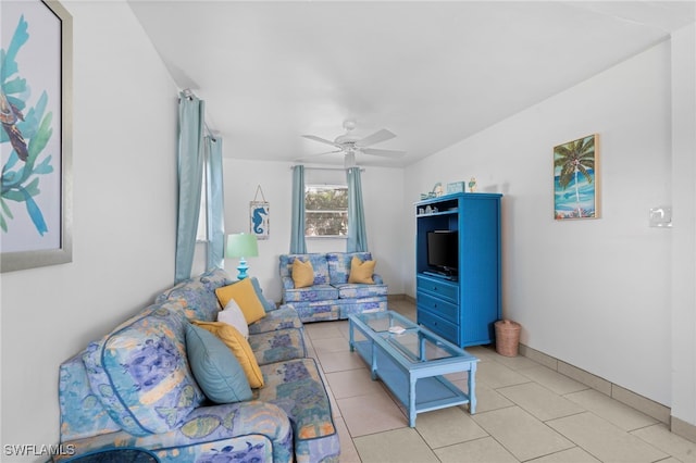 living room featuring ceiling fan and light tile patterned flooring