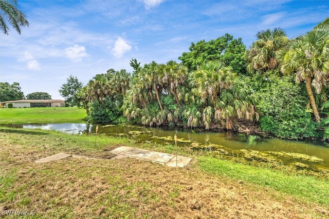 view of yard with a water view