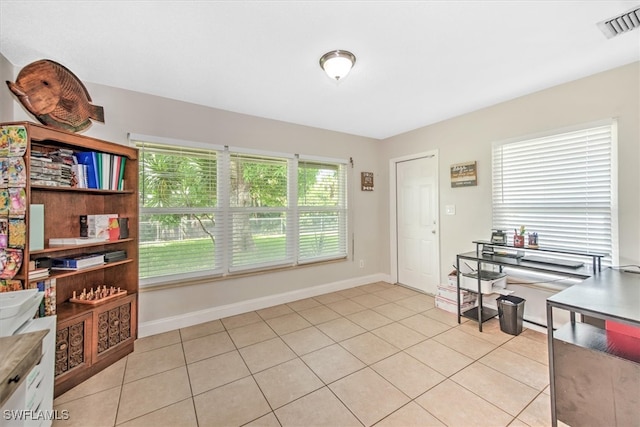 office space featuring light tile patterned floors