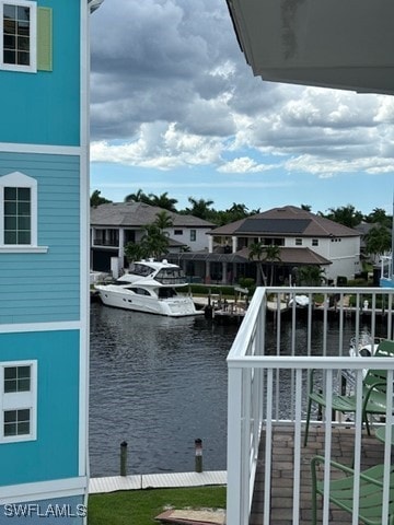 5825 Shell Cove Dr Unit 115, Cape Coral, FL 33914 - view of water feature featuring a residential view and a boat dock