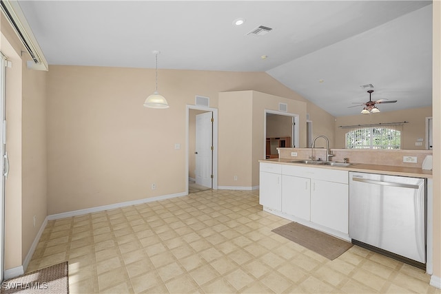 kitchen featuring sink, ceiling fan, hanging light fixtures, vaulted ceiling, and stainless steel dishwasher