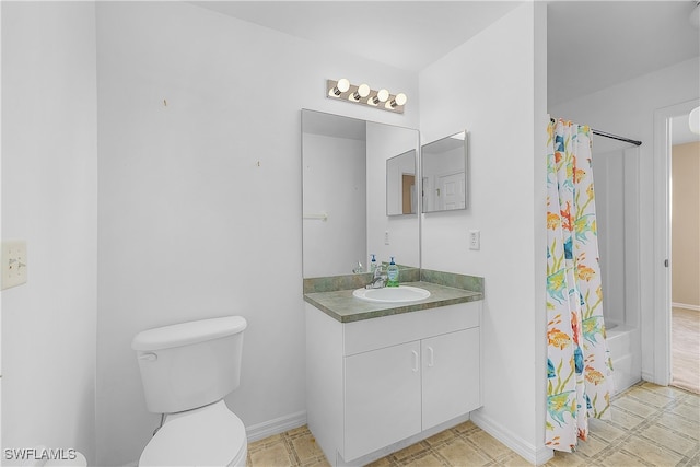 full bathroom featuring shower / bath combo with shower curtain, toilet, and vanity